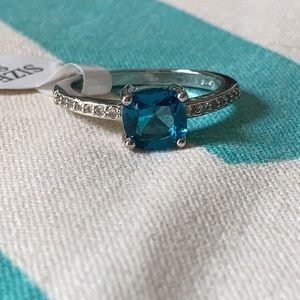 Blue cushion cut ring in silver